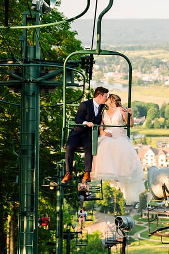 Bride and groom on chairlift